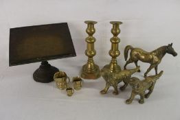 Collection of brass including heavy cast horse and dogs, book stand, candlesticks etc