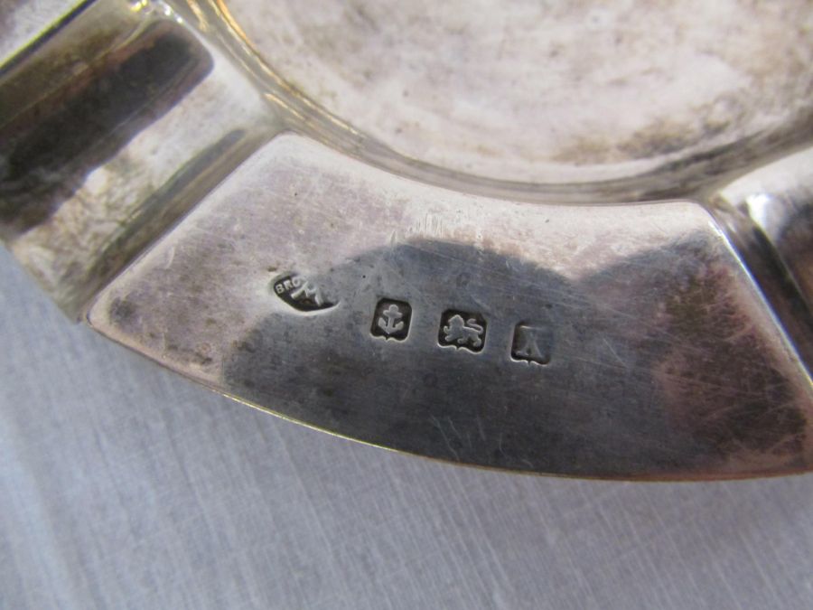 Selection of silver items to include a silver ashtray (1.86 ozt), match striker, wine holder, - Image 2 of 8