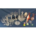 Collection of mixed glassware including fruit bowl, miniature paperweights, candlesticks etc