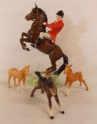 Beswick huntsman on rearing horse 868 (has signs of repair) pair of palomino foals (one showing