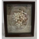 Carved marble plaque depicting grapes set in a plaster frame in mahogany case, 30cm w x 35cm h x