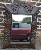 Large ornately  carved wooden framed wall mirror 82cm x 65cm