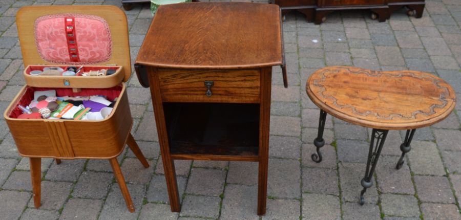 Drop leaf side table, a sewing box with contents and a kidney shape coffee table on wrought iron