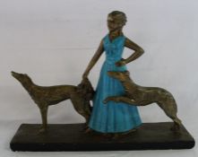 Art Deco painted plaster figure - lady with two dogs, 52.5cm wide