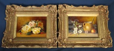 Pair of gilt framed oils depicting still life studies of fruit and flowers by Johannes Eerdmans (