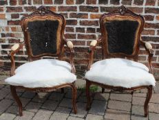 Pair of carved French style open armchairs for re-upholstery