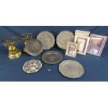 Collection of pewter plates, silver plate picture frame and brass lamps