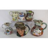 Mason's Ironstone jugs and a Royal Doulton Toby jug