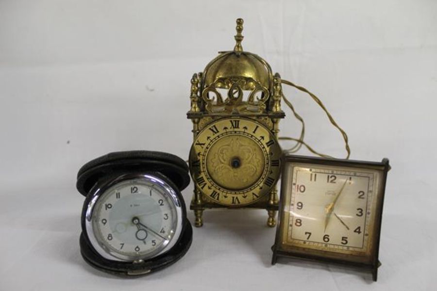 1917 brass shell casing, Smith brass electric lantern clock and 2 travelling clocks - Image 2 of 4