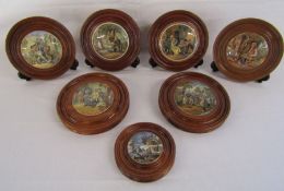 7 mounted pot lids to include The Wolf and the Lamb, A Fix, The Best Card, Il Pensoroso, The Village