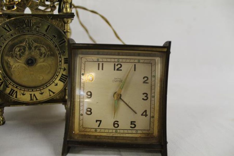 1917 brass shell casing, Smith brass electric lantern clock and 2 travelling clocks - Image 3 of 4