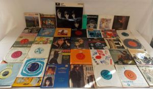 Beatles LP and a collection of singles including Wham, The Spacelings, etc