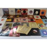 Collection of single vinyls including Elvis Presley, Stevie Wonder etc