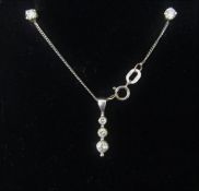 18ct white gold diamond set pendant and pair of diamond stud earrings