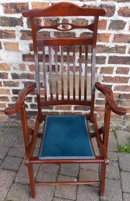 Edwardian mahogany folding campaign chair with cushioned seat