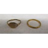 9ct gold signet ring 1.4g and 22ct gold ring 2.69g