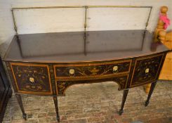 19th century bow fronted sideboard with ornate inlaid decoration on tapering legs with spade feet