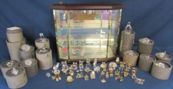 Collection of Swarovski crystal pieces - some boxed - with light up display cabinet, includes '