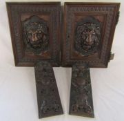 Pair of oak cupboard doors with carved lion's heads approx. 33cm x 42.5cm and 2 carved side panels