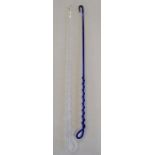 blue glass riding whip with whip spiralling around the cane and a clear glass riding whip with
