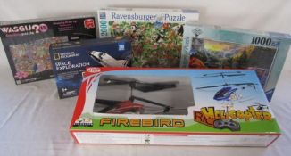 3 sealed jigsaws, National geographic space exploration and Firebird remote control helicopter
