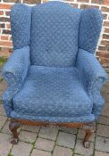 Upholstered armchair with ball & claw feet