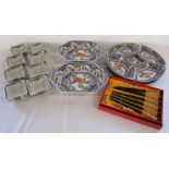 Oriental dinner ware including serving dishes, lazy Susan, chop sticks and bowls