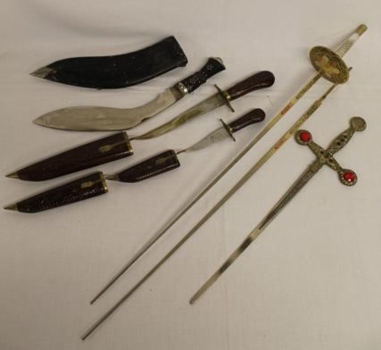 Kukri knives (one marked INDIA) and display swords