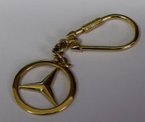 Marked as 750 & tested as 18ct gold Mercedes Benz key ring 20.0g