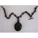 Victorian jet mourning pendant and watch chain slight damage - contains picture