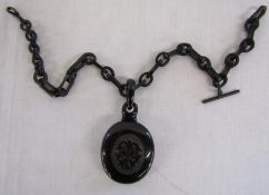 Victorian jet mourning pendant and watch chain slight damage - contains picture