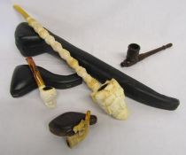 Cased Echt meerschaum pipes of varying sizes and a wooden pipe
