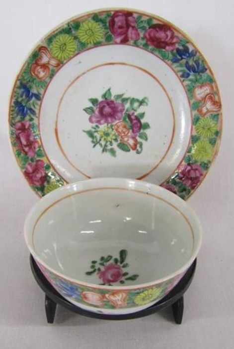 18th century Chinese porcelain tea bowl and saucer with floral design on stand