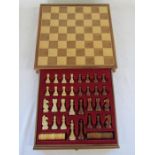 Wooden chess board with drawer and pieces