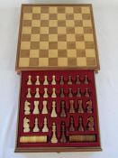 Wooden chess board with drawer and pieces