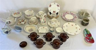 Various ceramic items including plates, tea pot, cups etc and a pestle and mortar,