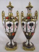 Royal Crown Derby style (labels scratched out) Imari pattern urns with covers approx. height 41.