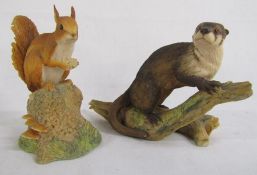 Border Fine Arts Otter on log Judy Boyt '81 and red squirrel
