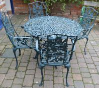 Cast alloy patio table and 4 chairs