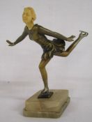 Art Deco ice skating figure on an onyx base with ivorine head approx. 22cm tall