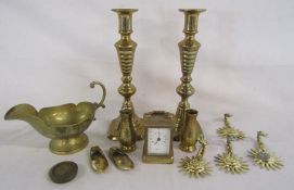 Collection of brassware including candlesticks and Angelus miniature battery clock