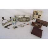 Small collection of items including silver plate, foreign ornamental shoes, leather purses etc
