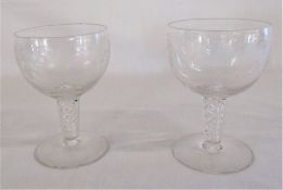 Two wine glasses with engraved decorations & spiral stems , possibly 19th century, one with chip