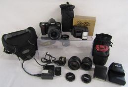 Nikon D40 digital camera with charger, Nikon DX AF-S Nikkor 35mm lens, Nikkor 50mm lens and 18-