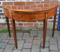 George III demi lune fold over card table in mahogany on tapering legs with inlaid decoration Dia.