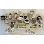 Various ceramic items including vases, tea cups, etc