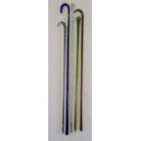 5 glass canes - pale green spirally moulded cane with hollow ball finial containing coloured beads -