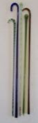 5 glass canes - pale green spirally moulded cane with hollow ball finial containing coloured beads -