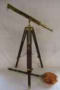 Large brass telescope on wood and brass floor standing tripod and a copper and brass bed pan