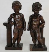 Pair of carved wooden cherubs 34cm high